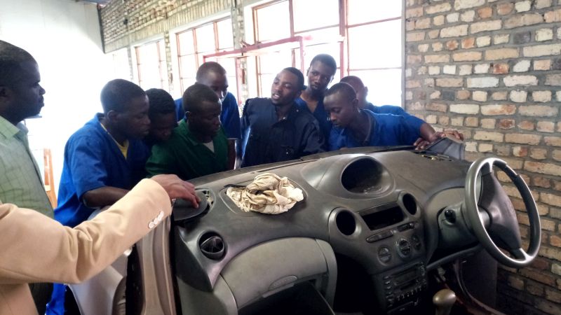 Students and a teacher of automobile wiring system at Hanika Polytechnic college