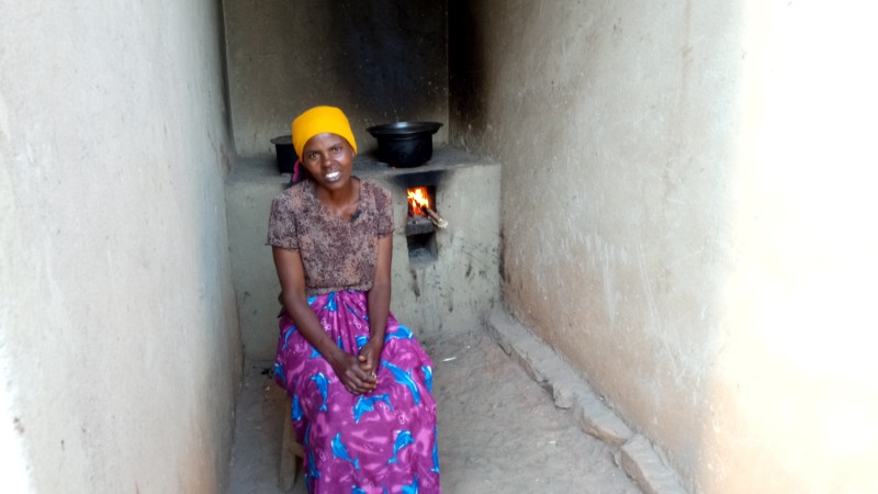 A happy beneficiary of our energy saving stove.