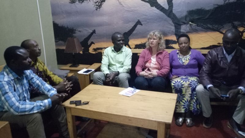 The guest Ms Sabine Schneider discussing with officials from EAR Church Butare diocese