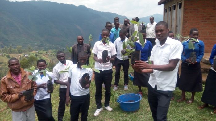 Community members receive seedlings