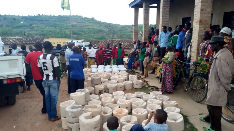 Community members waiting for distribution of Improved Cook Stoves and Ceramic Water Filters