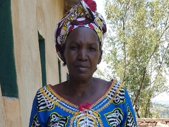 Mukahirwa Lydia, 56, small business of buying and reselling domestic animals