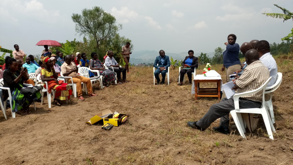 Attendees of the ceremony and other guests of hanour listening carefully to the mayor