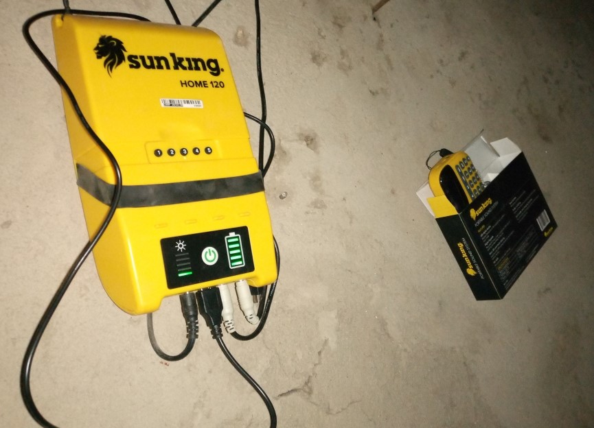 The battery & charge controller and the radio fixed on a wall